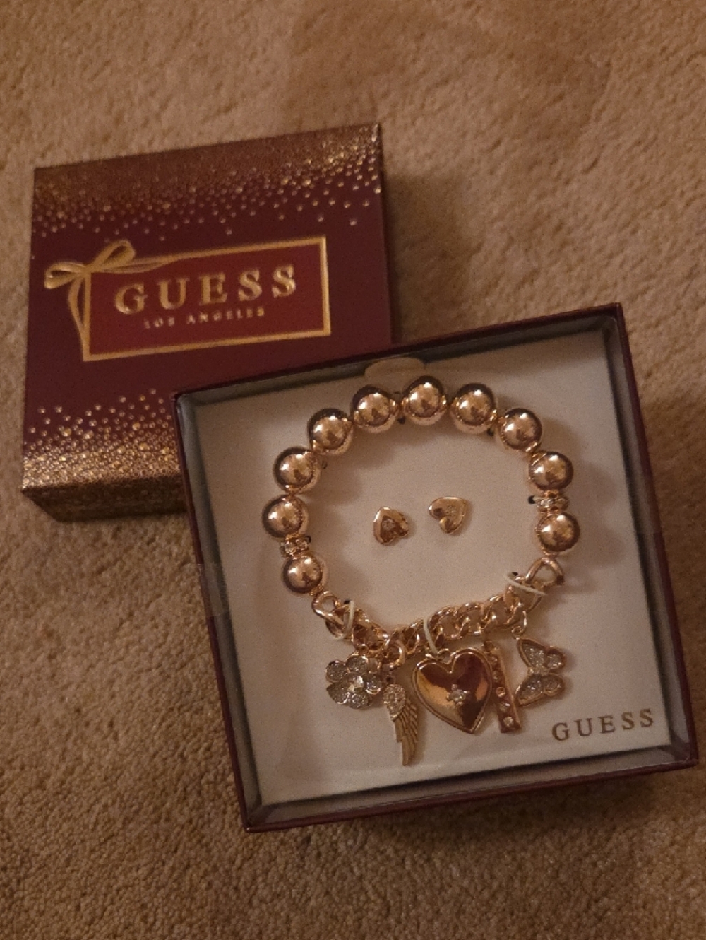 ❤️❤️ Guess Silver Tone Charm Bracelet with Heart, Wing & Flower Charms - Picture 2 of 5